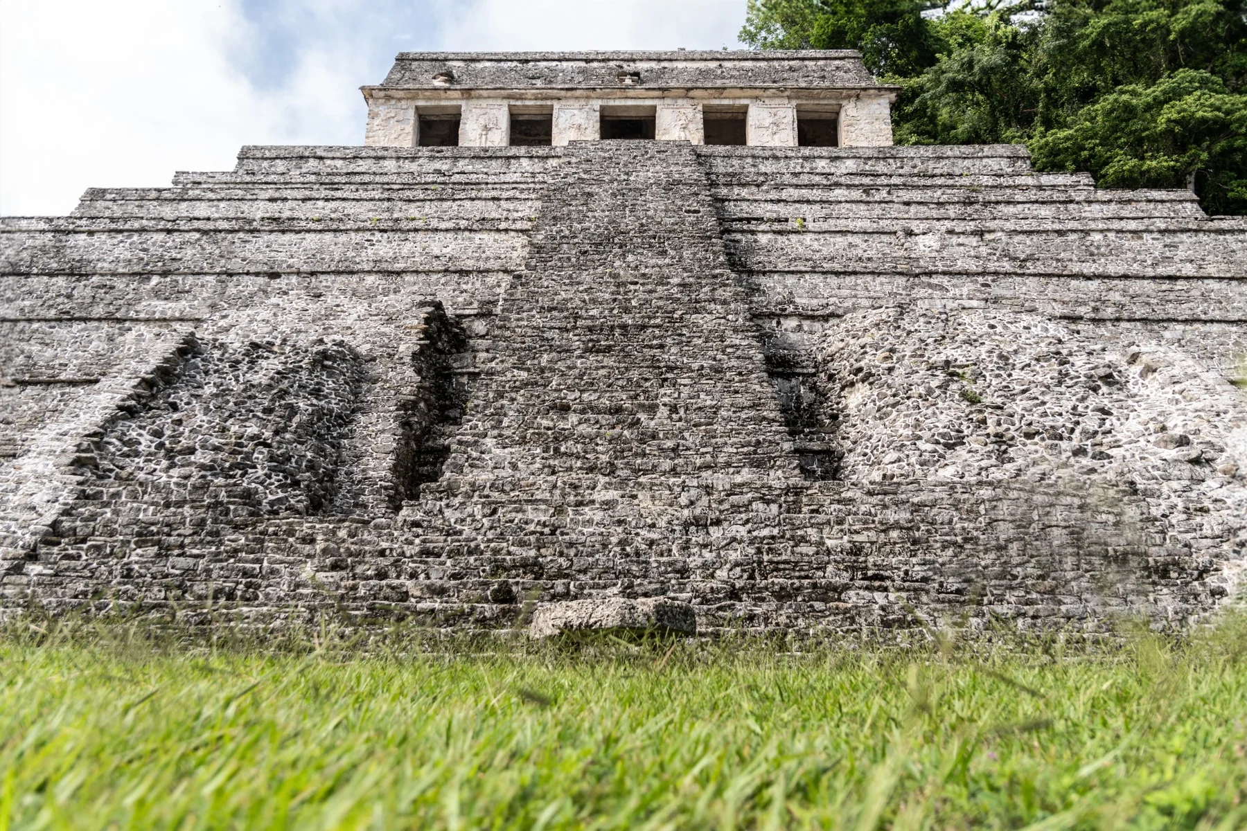 A large stone staircase at a Maya archaeological site.